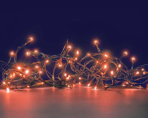 Guirlande lumineuse animée à 64 LED cuivre sur câble vert Flicker Light® - 5 m