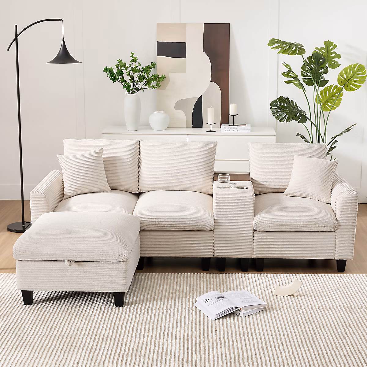 Canapé angle 4 places 229 × 149 – 5 × 83 cm avec console, poches laterales, ports USB et pouf coffre en tissu cotele beige