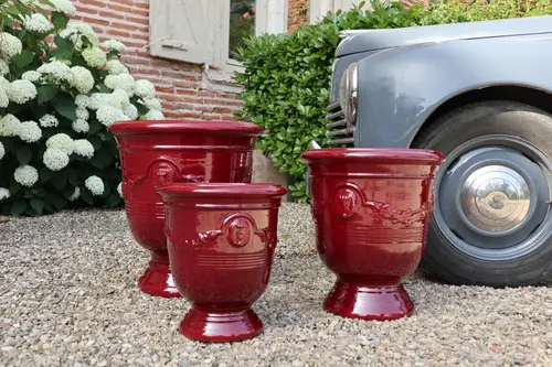 Pot sur pied en terre émaillée coloris cerise Les Poteries d'Albi Pied Guirlande - Ø 40 x H 46 cm