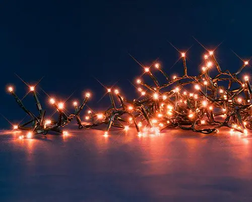 Guirlande lumineuse à 170 LED cuivre + 30 LED flash sur câble vert Flicker Light® Compact - 5 m