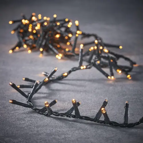 Guirlande flicker snake light animée 700 LED blanc orangé sur câble noir - 14 m