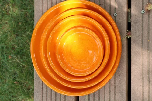Soucoupe en terre cuite émaillée orange Savane Les Poteries d’Albi - Ø 41 cm
